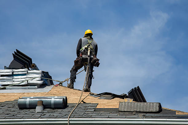 Professional Roof Replacement technician working in Brownsville, OH